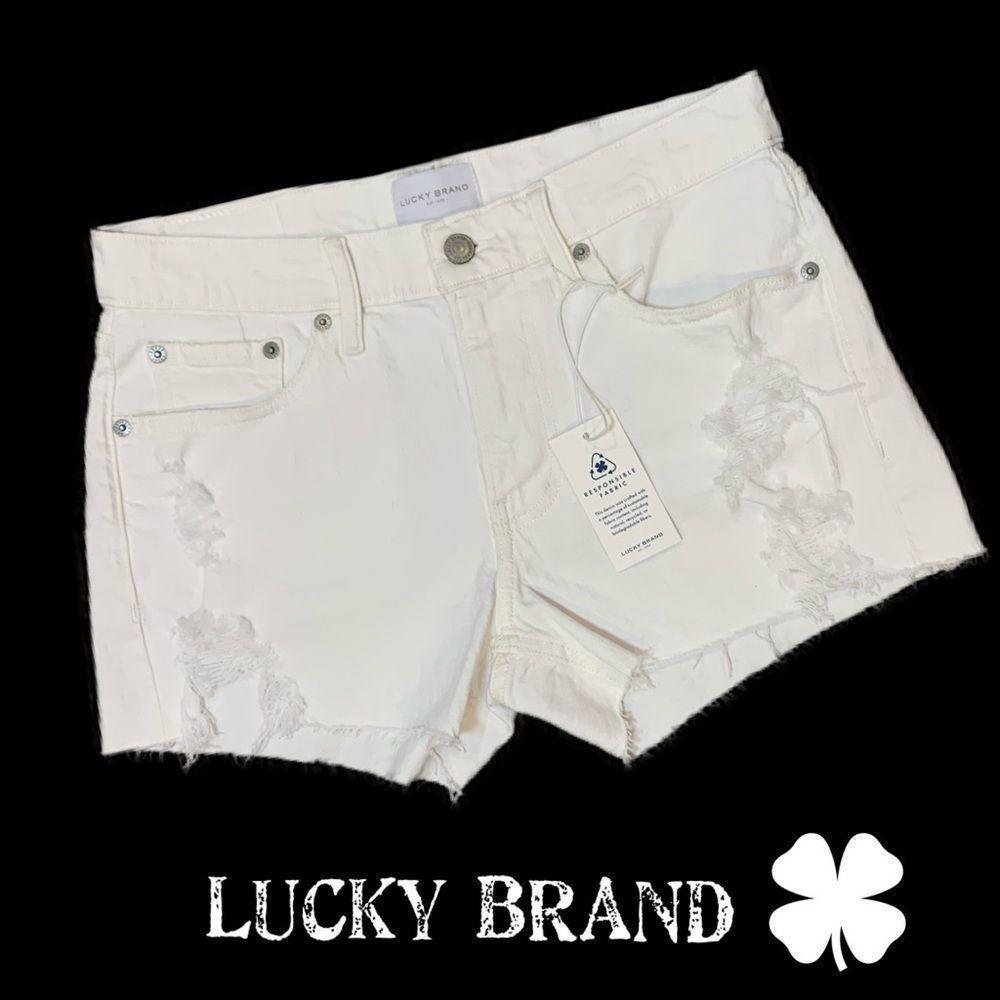 Lucky brand white distressed raw hem mid rise shorts boy cut. Never worn